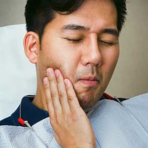 Man with the tooth pain